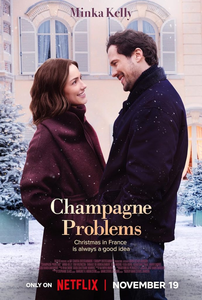 Netflix Champagne Problems movie poster showing the leasds smiling, standing in the snow